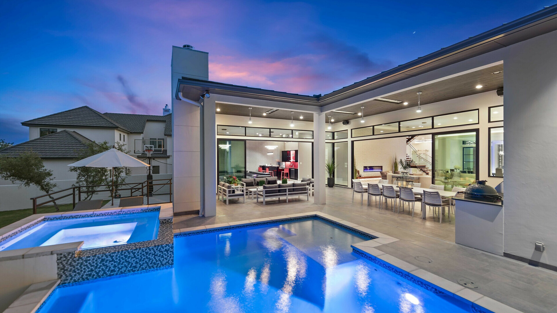 Exterior of luxury custom home boasting indoor-outdoor living elements, San Antonio TX