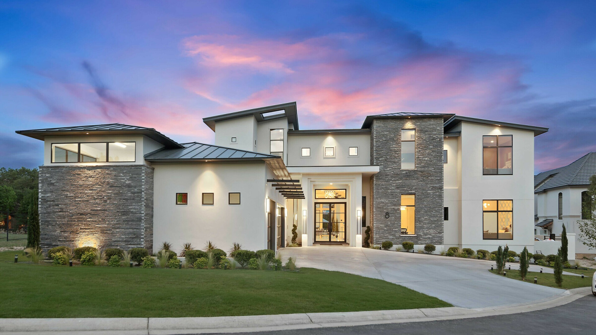 Front view of luxury modern home at sunset, San Antonio TX
